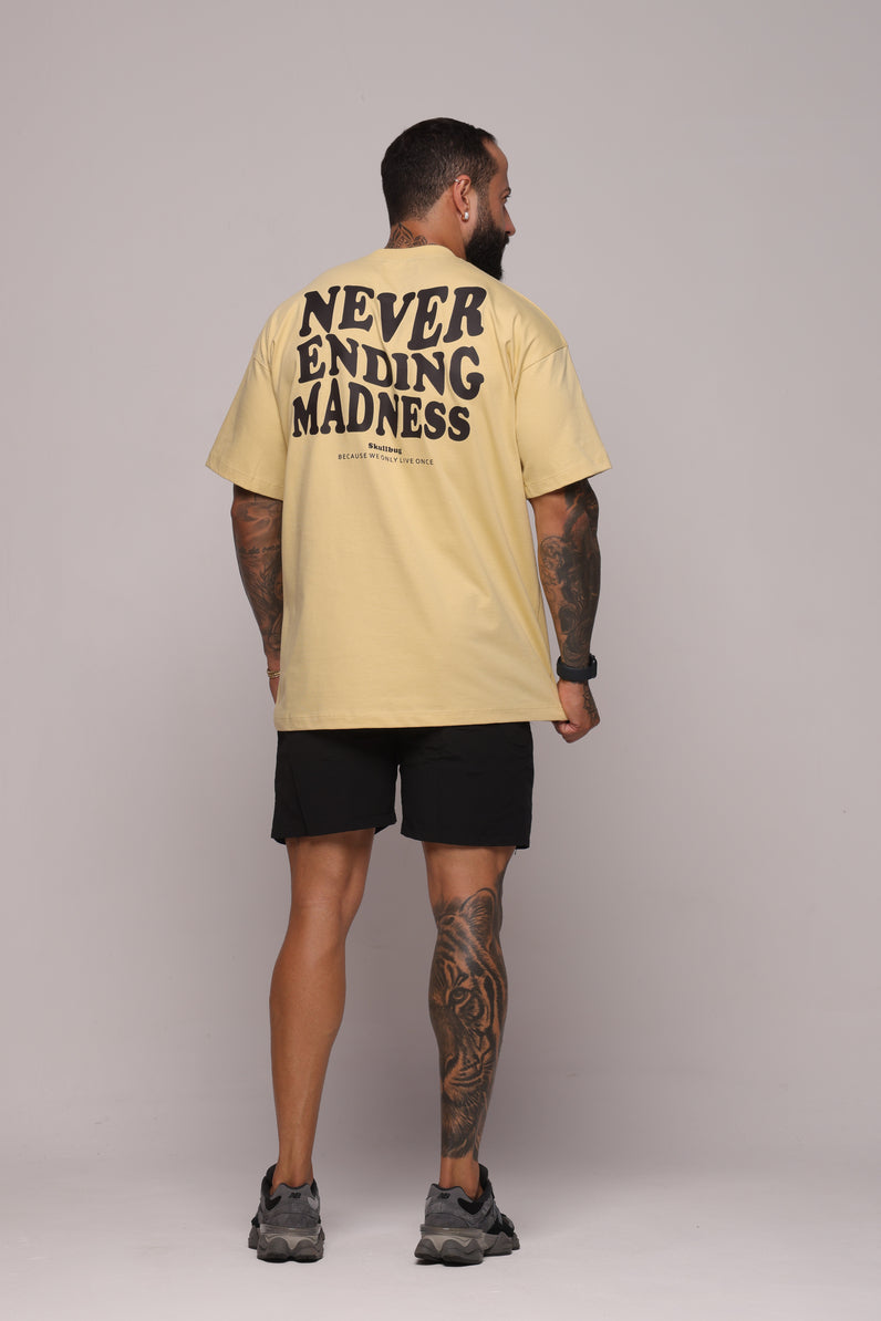 Camiseta oversized "Never ending" strong mostarda = 250g