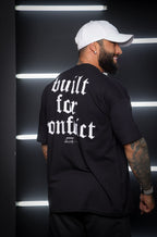 Camiseta oversized "Built for conflict" - preta